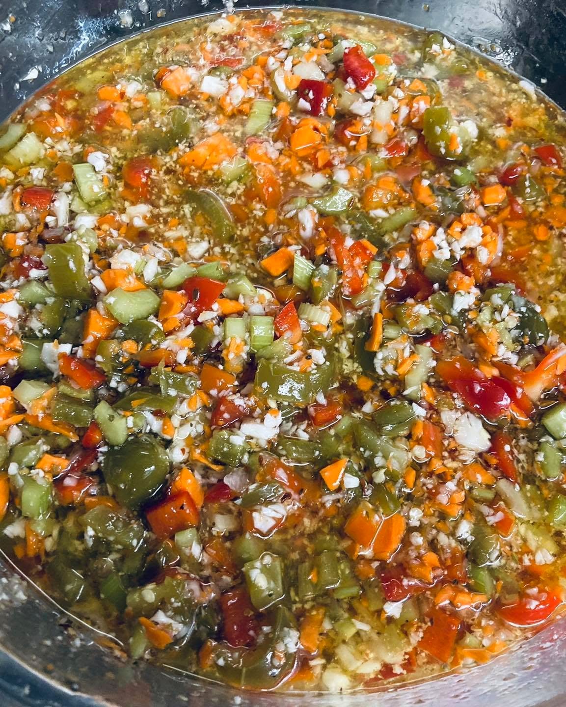 Close-up of giardiniera — celery, peppers, carrot, onion and garlic in oil